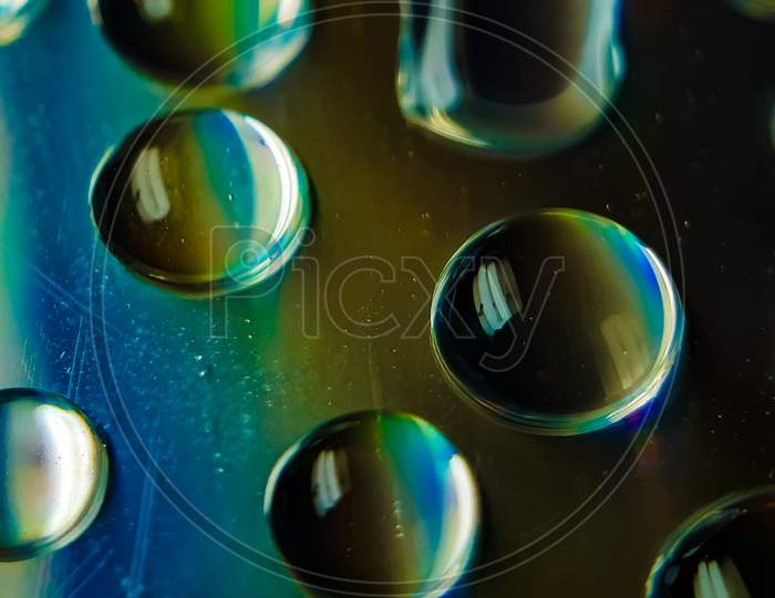 Reflection Of Water On Cd Discs.
