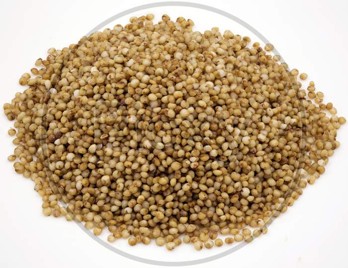 Close-Up Of Kodo Millet Grains On A  White Background