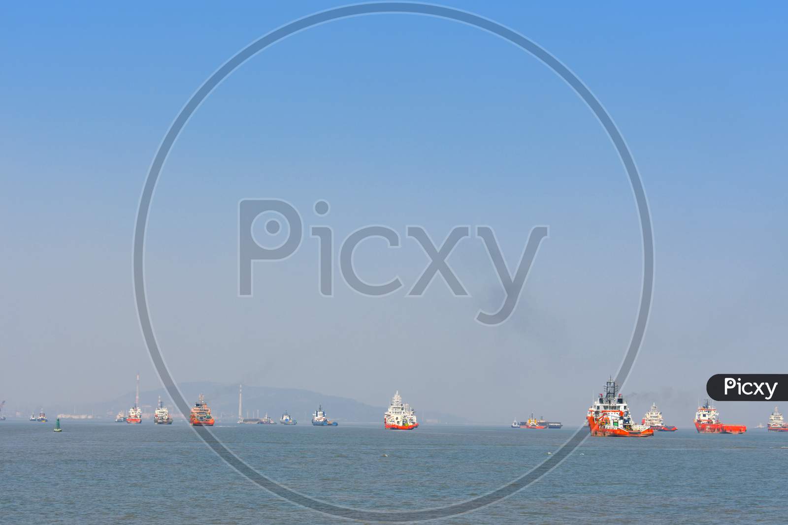 Merchant Boats Parked In The Blue Ocean Near Mumbai