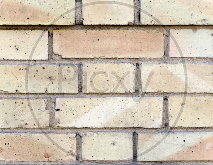 Wall Made Up Of Faded Colored Bricks Looking Stunning In Rectangular Pattern