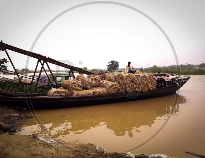 A boat laden with jute on the river ganges.