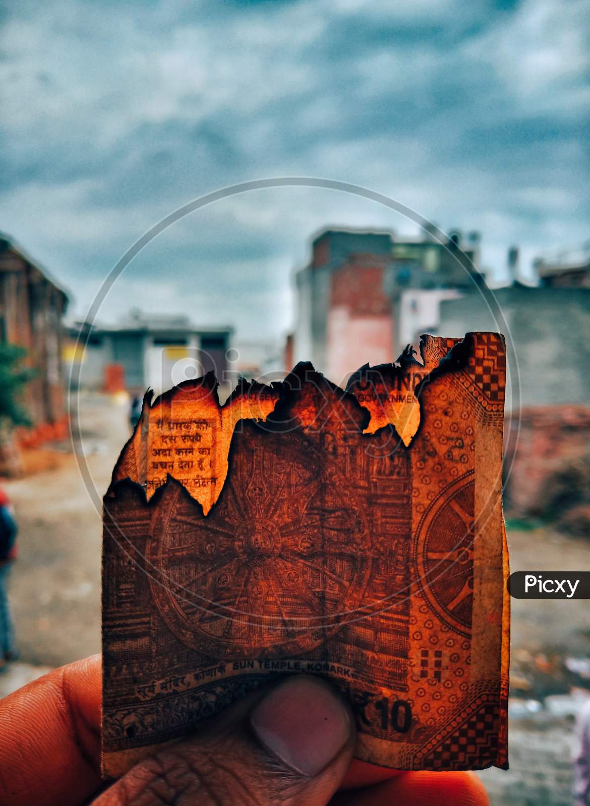 peice of a burning currency , art, creative photography