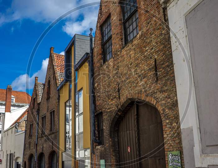 Cobble Stoned Street In The City Of Brugge, Belgium, Europe