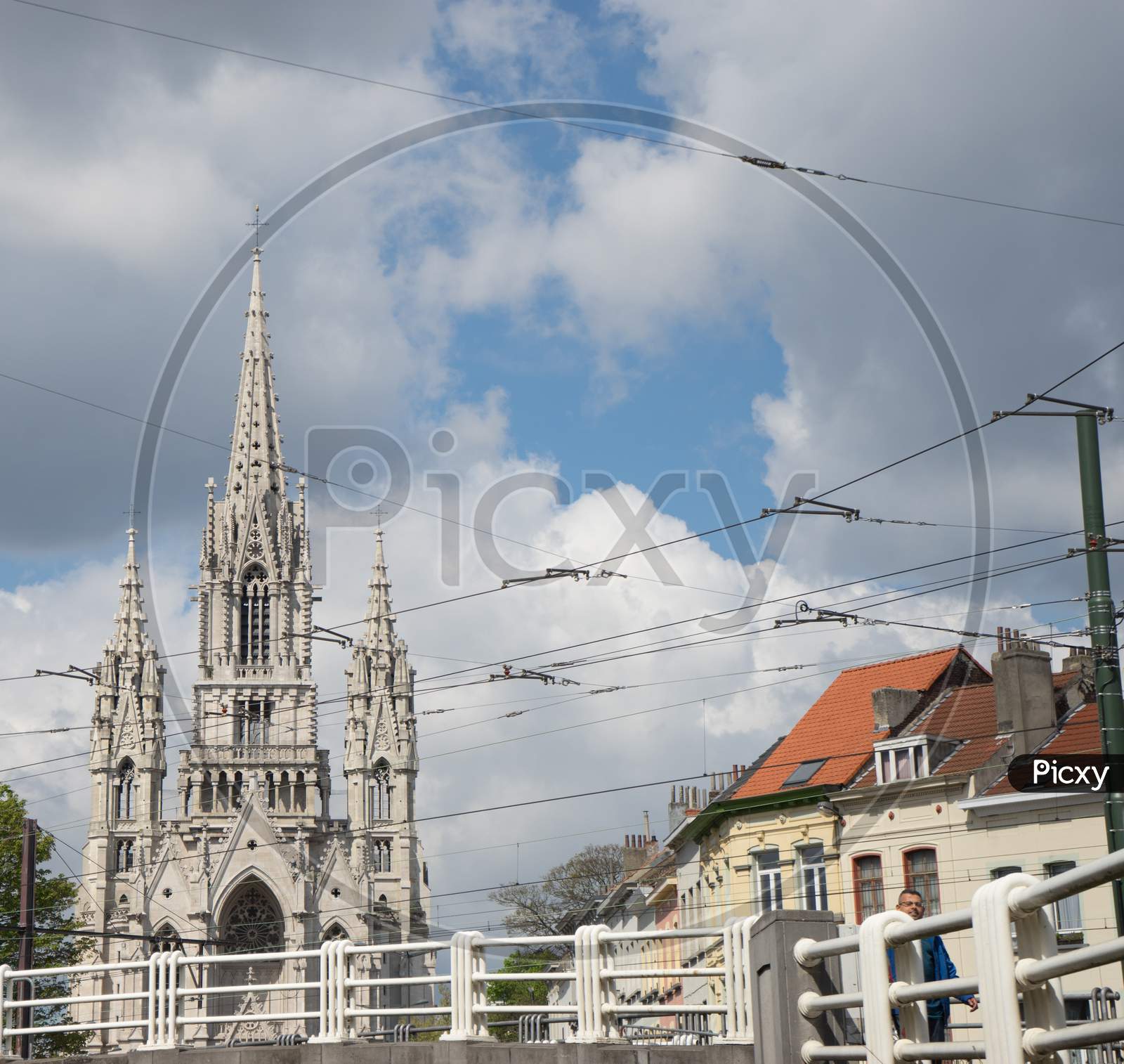 Brussels, Belgium - April 17 : A Man Walks In Front Of Church Of Our Lady Of Laeken Near The Atomium In Brussels, Belgium On April 17, 2017