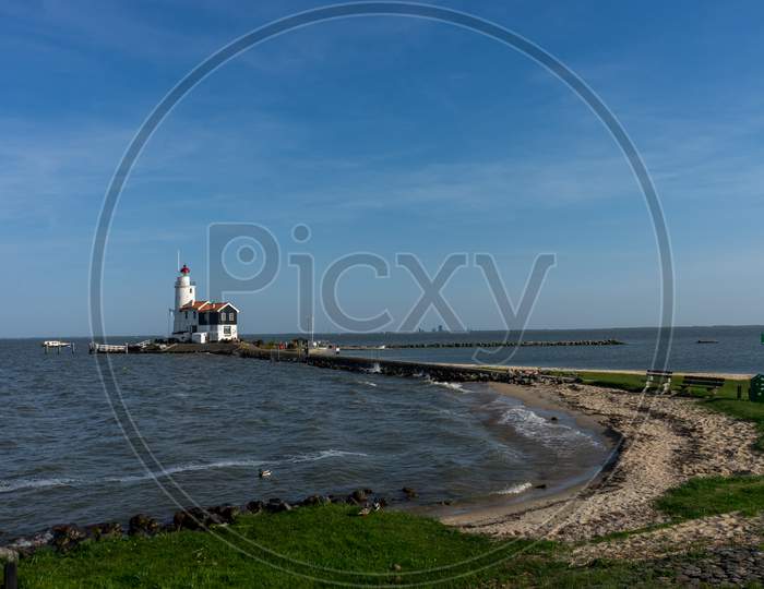 Netherlands,Wetlands,Maarken, Lighthouse By Sea Against Sky