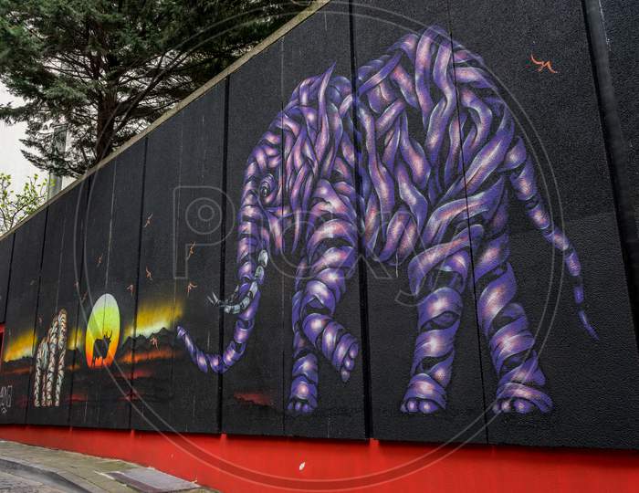 Brussels, Belgium - April 17 :  A Blue Fresco Of An Elephant And Bull Painted On The Walls Of A Building At Brussels, Belgium, Europe On April 17.