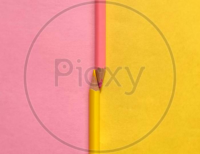 Two colour pencil with coloured background