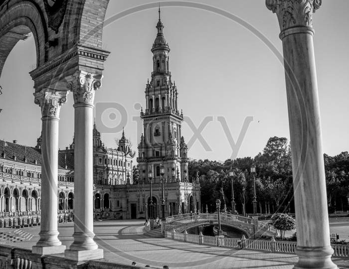 Seville, Spain- June 18, 2017 : People Walk In The Courtyard Of The Plaza De Espana In Seville, Spain June 2017 On A Hot Summer Day.