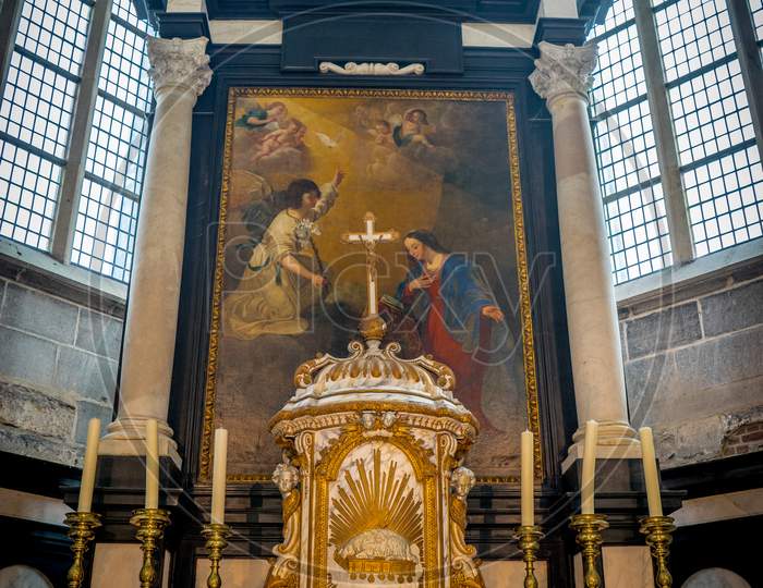 The Altar With Candles In The Interiors Of Saint Nicholas Church, Ghent, Belgium