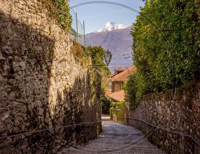 Italy, Menaggio, Lake Como, Narrow Cobblestone Street