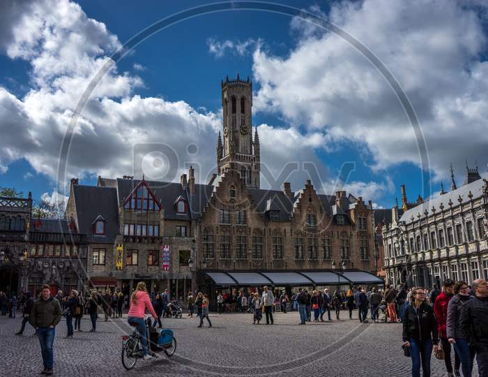 Brugge, Belgium - April 17 :  Toursists Walking At The Burg Square In Bruges, Belgium, Europe