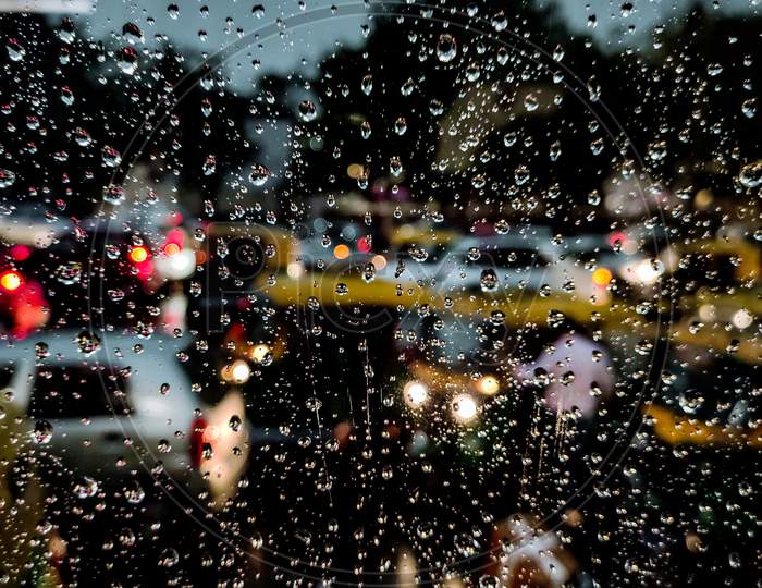 Rain drops on the window ( Rainy days)