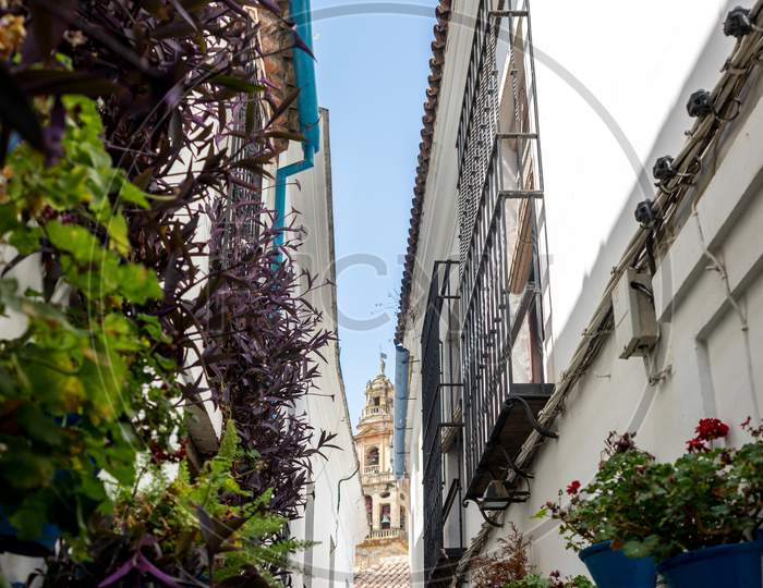 Spain, Cordoba, Low Angle View Of Buildings Against Blue Sky