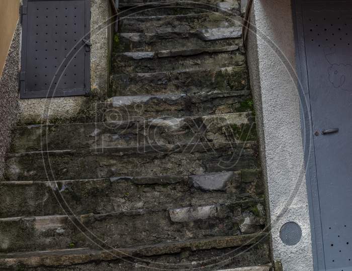 Italy, Varenna, Lake Como, A Close Up Of A Narrow Stairs