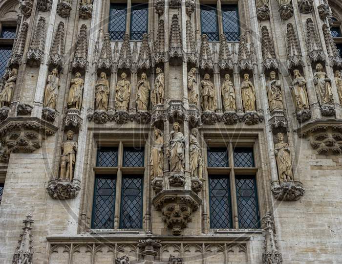 Saints And Knights Of Christianity Sculpted On The Wall Of The Palace At Brussels, Belgium, Europe