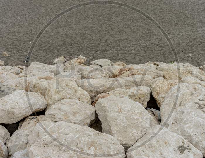 Stone Along The Malagueta Beach In Malaga, Spain, Europe