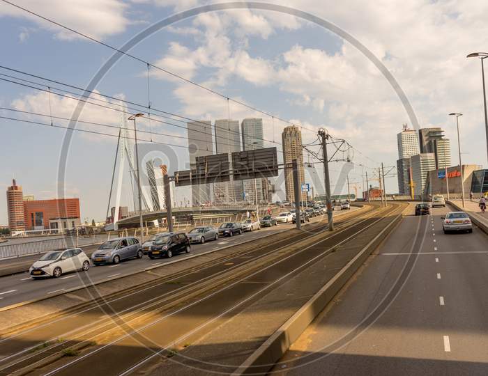 Rotterdam, Netherlands - 27 May:  Car Driving On A City Street Filled With Lots Of Traffic At Erasmus Bridge Rotterdam On 27 May 2017. Rotterdam Is A Major Port City In The Dutch Province Of South Holland