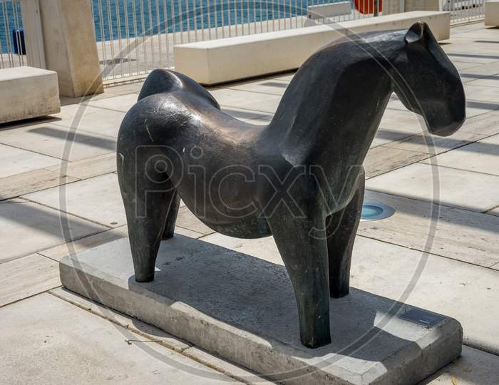 Sculpture Of A Stone Horse At The Malagueta Beach At Malaga, Spain, Europe