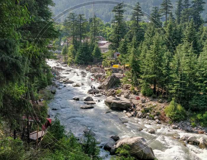 Manali, India - June 9Th 2019: People Crossing River Stream Through Ropes By Rappelling In Manali Adventure Park.