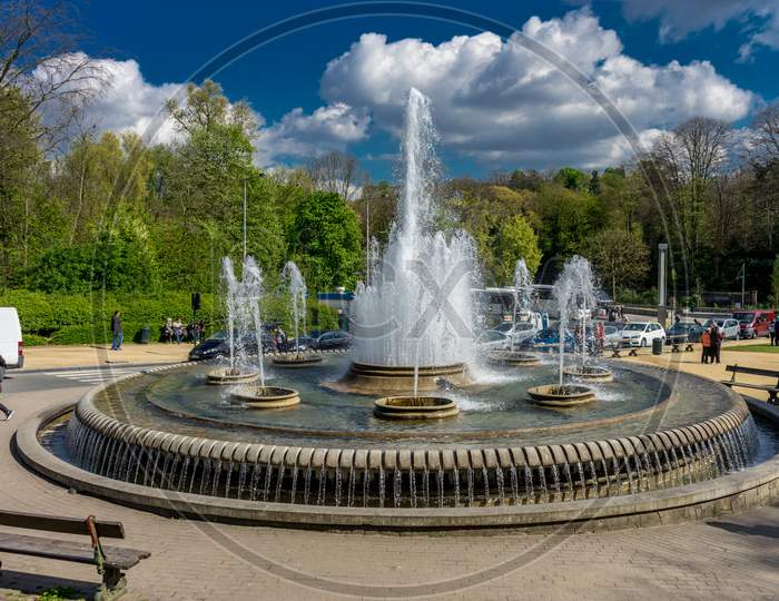 The Water Fountain In Front Of The Atomium Monument At Brussels Belgium