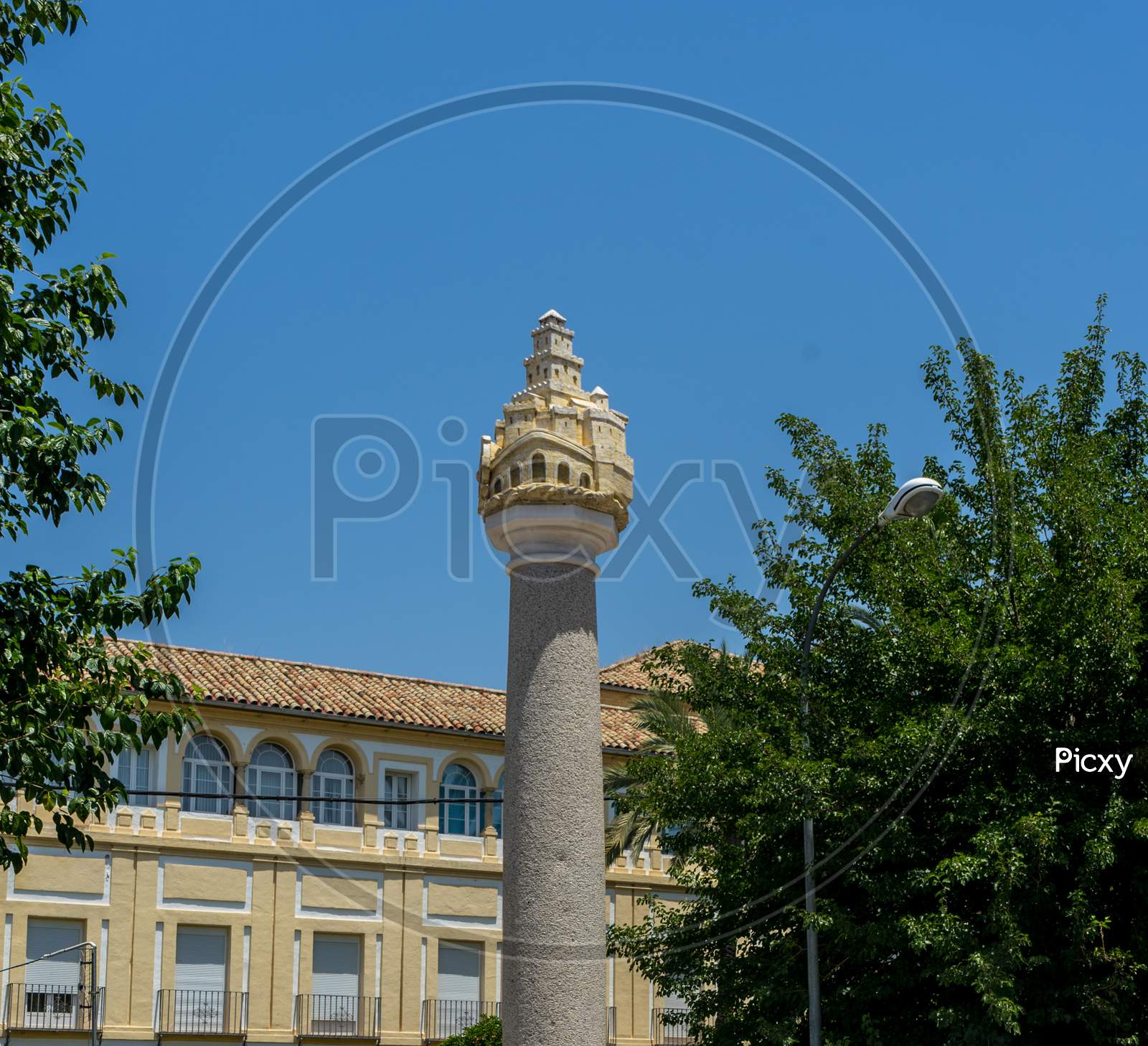 Spain, Cordoba, Low Angle View Of Pillar Against Blue Sky