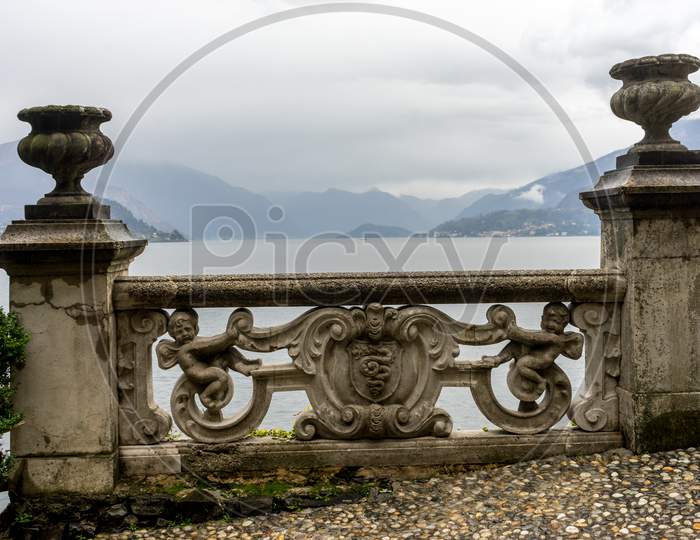 Italy, Varenna, Lake Como, A Wall Overlooking The Lake