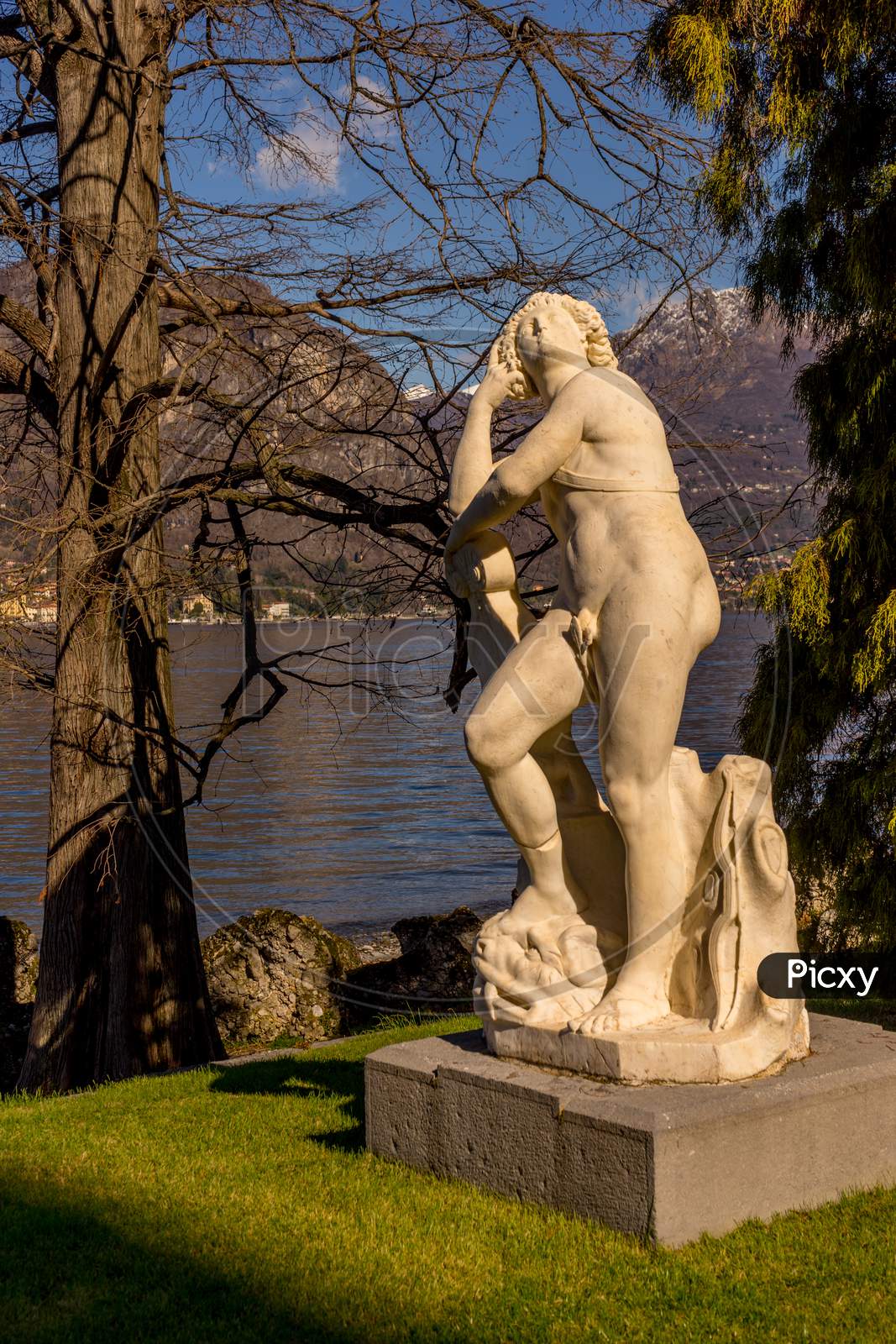 Bellagio, Italy-April 1, 2018: Statue Of Apollo By G.Della Porta 16Th Century At Giardini Di Villa Melzi
