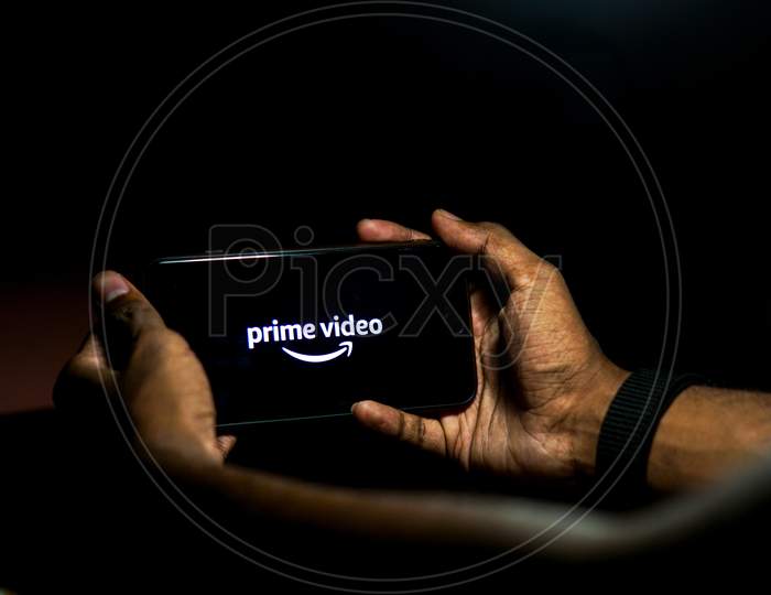Amazon Prime Video Mobile App Icon Opening on Smartphone Screen Closeup