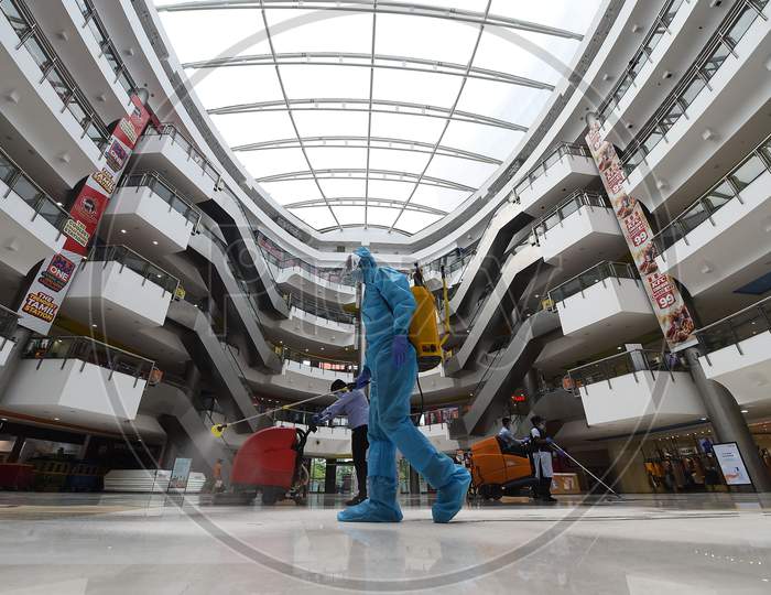 A Worker Sanitises The Floor Of A Shopping Mall Reopened After The Government Eased A Nationwide Lockdown Imposed As A Preventive Measure Against The Covid-19 Coronavirus, In Chennai On September 1, 2020.