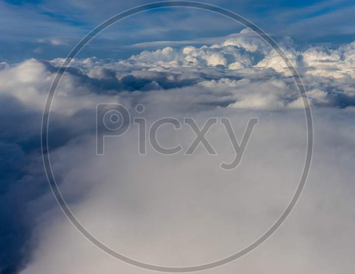 View From The Sky, Cloud, A Plane Flying Through A Cloudy Sky
