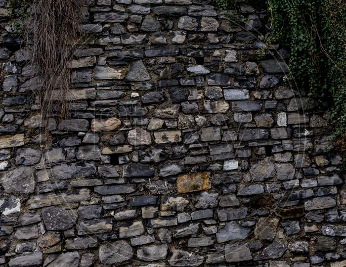 Italy, Varenna, Lake Como, View Of Stone Wall