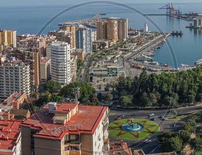 Panorama City Skyline And Harbour, Sea Port, Bullring Of Malaga Overlooking The Sea Ocean In Malaga, Spain, Europe  On A Summer Day