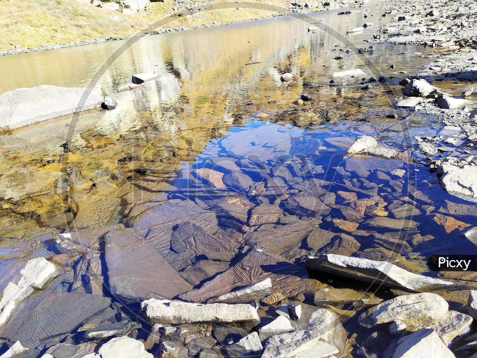 Rocks under transparent river