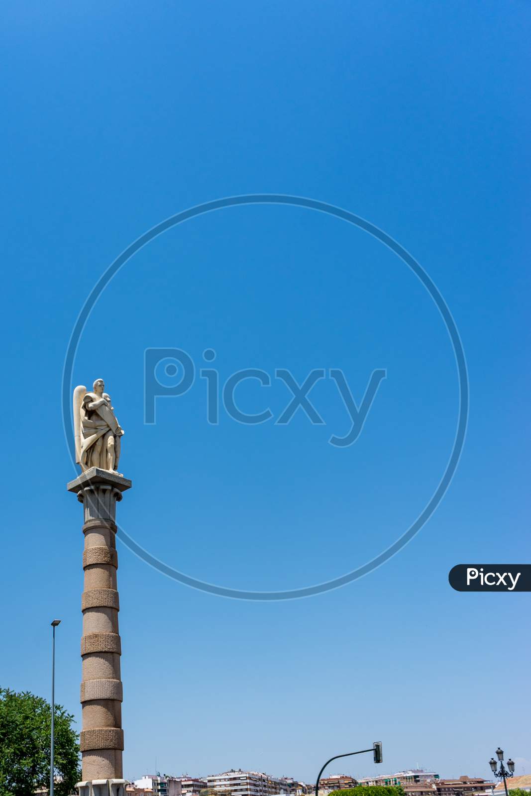 Spain, Cordoba, Low Angle View Of Statue Of Building Against Blue Sky