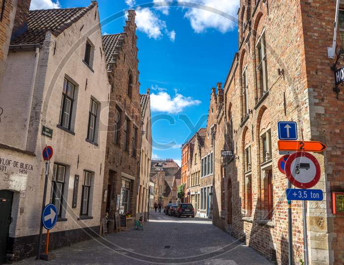Brugge, Belgium - April 17 :  Toursists Walking On The Cobble Stoned Street At Bruges, Belgium, Europe