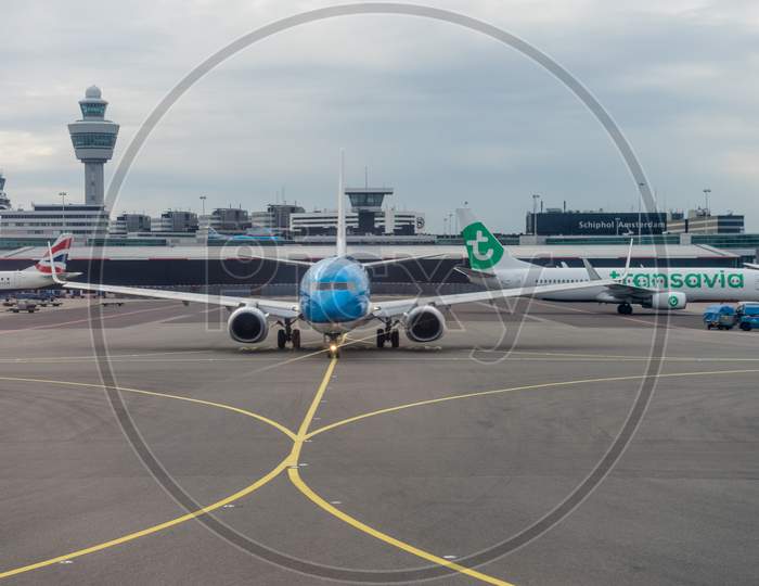 Netherlands, Amsterdam, Schiphol - 30 March, 2018: Transavia Klm  Planes At Airport. Schiphol Is One Of The Busiest Airport In Europe.
