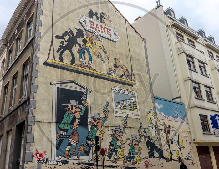 Brussels, Belgium - April 17 :  A Fresco Of An Bank Robbery On The Walls Of A Building At Brussels, Belgium, Europe On April 17.