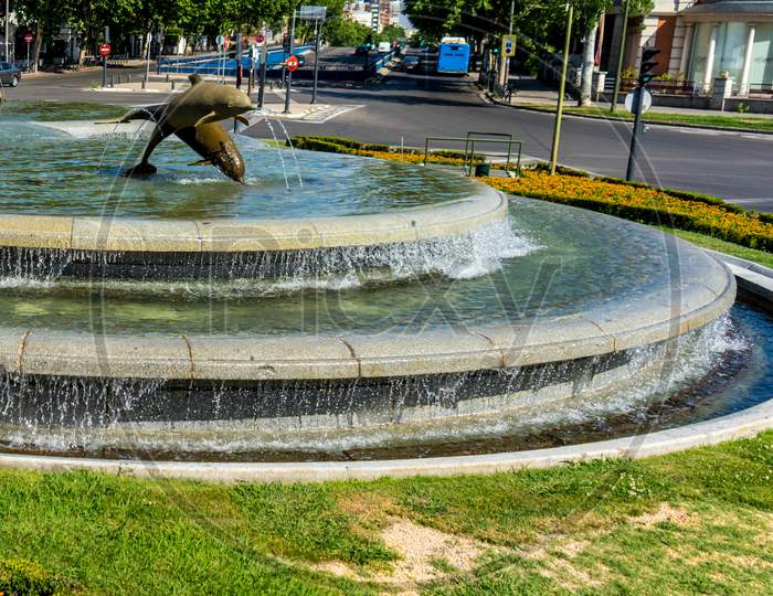 Fountains With Dolphins At Repьblica Del Ecuador Square, Madrid Spain