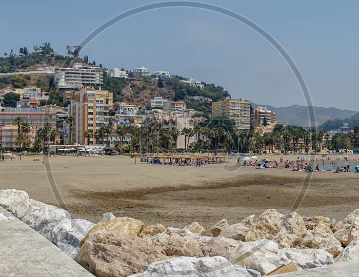 Panoramic View Of The Ocean At Malagueta Beach With Rocks At Malaga, Spain, Europe