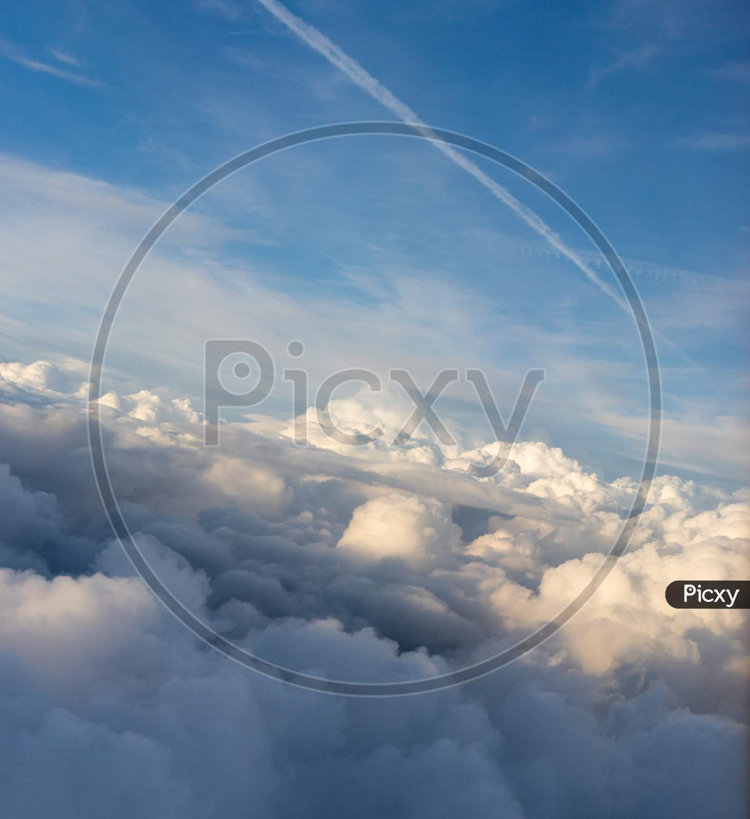 View From The Sky, Cloud, A Plane Flying Through A Cloudy Blue Sky