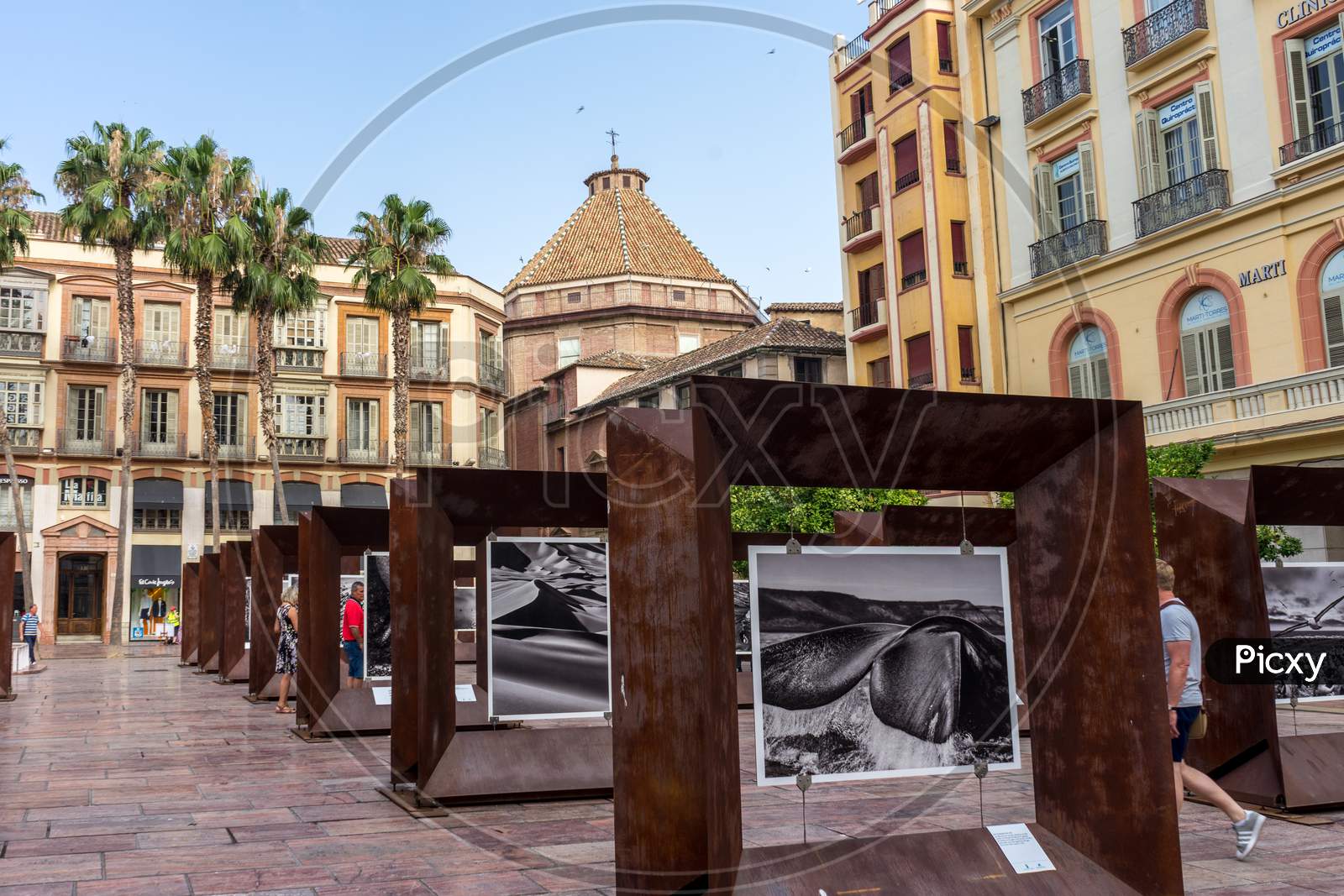 Malaga, Spain - June 24: Tourists Walk Past The Paintings At Caixa Forum In Malaga, Spain, Europe