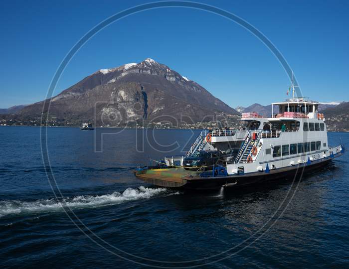 Menaggio, Italy-April 2, 2018: Transport Boat At Waterside Quay, Lombardy