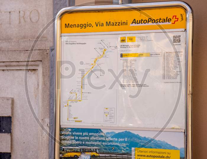 Menaggio, Italy-April 2, 2018: Information Board On Autopostale Menaggio Via Mazzini, Lombardy