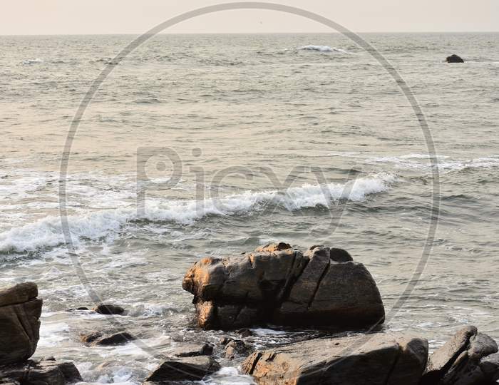 Sea shore and rocks and water