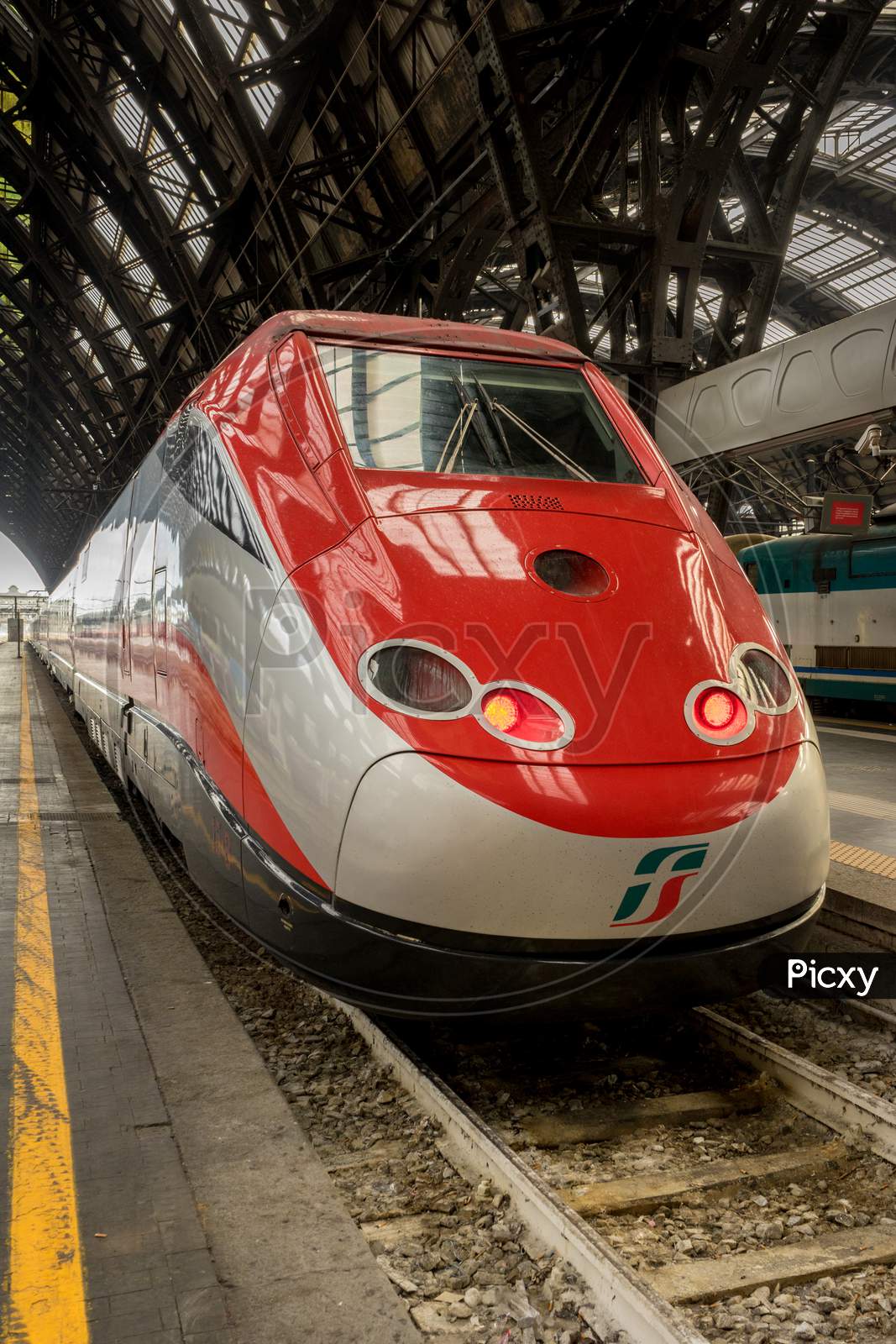 Milan Central Station - March 31: The Frecciarossa Trenitalia At Milan Central Railway Station On March 31, 2018 In Milan, Italy. The Milan Railway Station Is The Largest Train Station In Europe By Volume