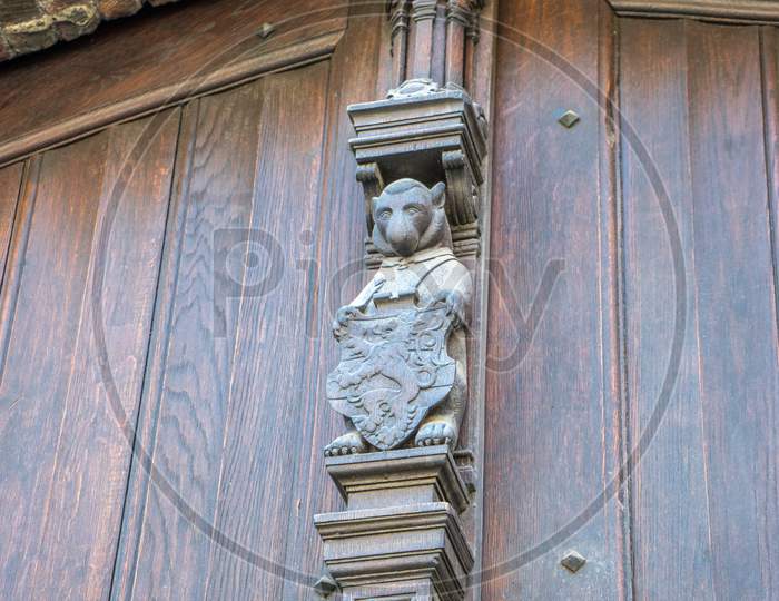 Sculpture Of A Bear Holding A Shield With The Emblem Of Brugge In Bruges, Belgium, Europe
