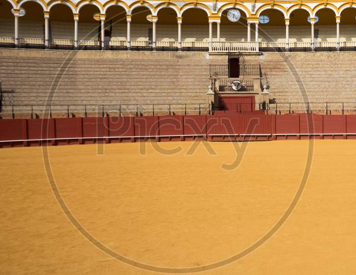 Seville, Spain- June 18, 2017:Tourists Walk Inside Inside The Bull Fighting Ring In Seville, Spain June 2017