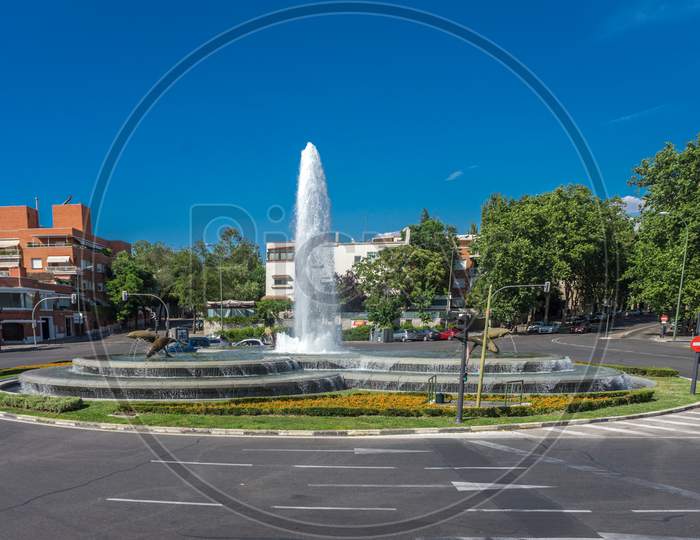 Madrid, Spain - June 17 : Dolphin Water Fountain Square On The Streets Of Madrid On A Warm Summer Day, Spain, Europe On June 17, 2017.