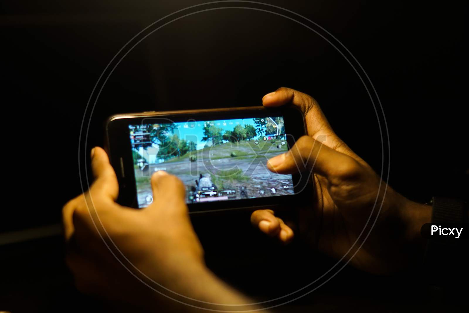 Close up shot of a Person playing Banned PubG Mobile Game in Smartphone