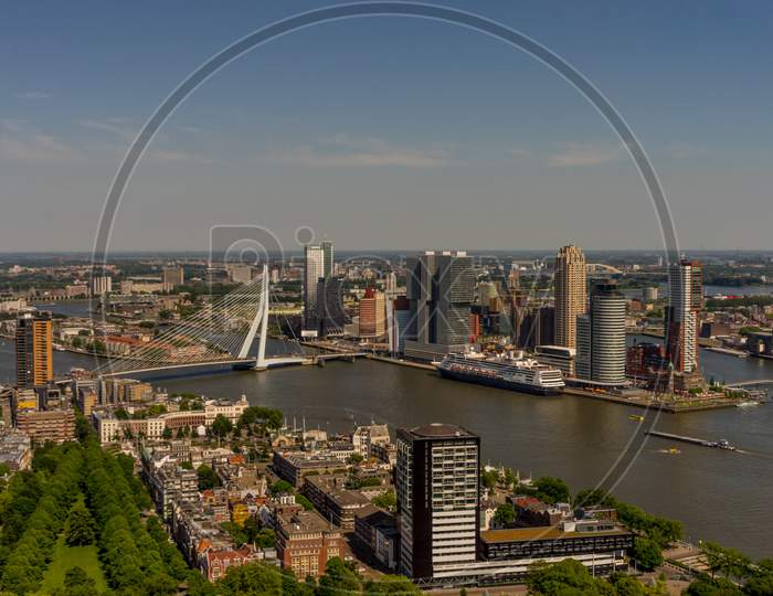 Netherlands, Rotterdam, Cityscape And Skyline Of The City With Erasmus Bridge
